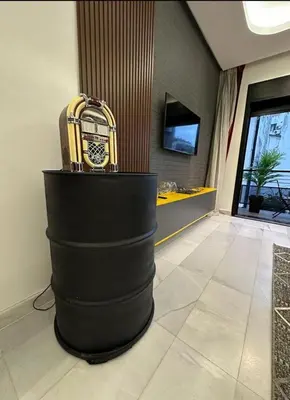 a suitcase sitting on a table in a lobby at A 1 pas de Zara Studio Centrale et Design in Casablanca