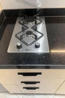 a stove top oven sitting on top of a counter at Studio charment près de la mosqué Hassan II in Casablanca