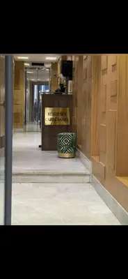 a hallway of a building with a bag on the floor at Studio lumineux et cosy in Casablanca