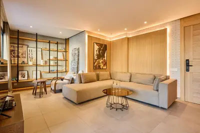 a living room with a couch and a table at Terrasses and Sunset Duplex Luxe 3 Bed in Ghandi in Casablanca