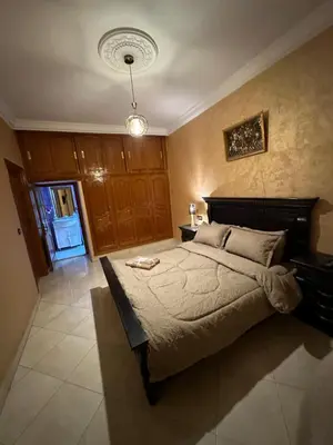 a bedroom with a large bed in a room at 3-Bedroom Apartment - Rabat - 2Baths & 2Balconies in Rabat