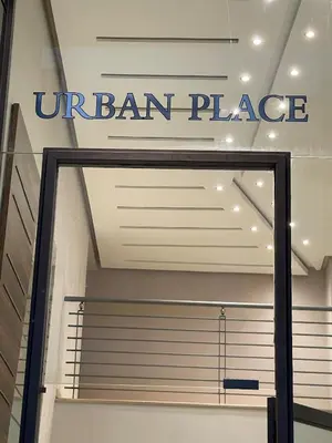 a sign for an entrance to a ulan store at Studio Chic proche Twins Center in Casablanca