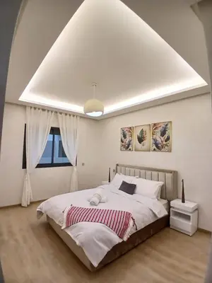 a bedroom with a large bed and a large window at Cozy 2-bedroom apartment, pool view with beach access a Zenata City Eco Casablanca in Oulad Akkou
