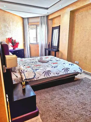 a bedroom with a bed and a window at Bonheur Au bord de la mère in Casablanca
