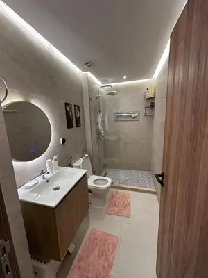 a bathroom with a sink and a toilet at High standing 2 bedroom apartment in Casablanca
