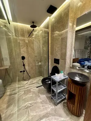 a bathroom with a toilet and a sink and a shower at SALVia Loft - Sweetness and Cozy Apartment with Terrace Near Mohammed V Stadium in Casablanca