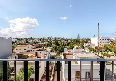 a view of a city from a balcony at Studio Luxe avec vue Magnifique WiFi Haut Debit et Netflix Inclus in Casablanca