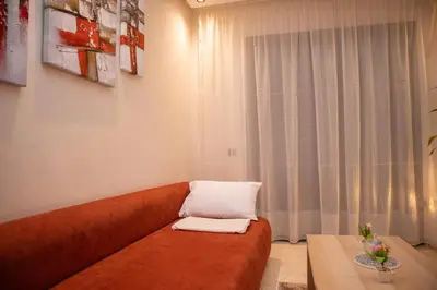 a living room with a couch and a table at R109- Outstanding 1 BR Aprt with Great View in Casablanca