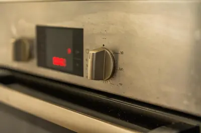 a close up of a toaster oven with a red light at C08- Anfa Place Luxury Apartment - Beach Access in Casablanca