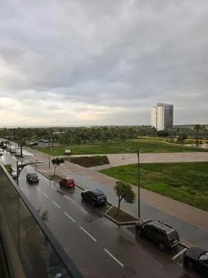 a view of a street with cars parked on the road at Appartement in Casablanca