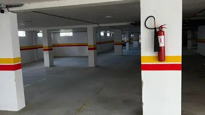 an empty parking garage with a fire hydrant on a pole at Cozy 2-bedroom studio in Casablanca