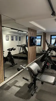 a gym with several exercise bikes in a room at studio luxe rooftop & gym quartier des princess in Casablanca