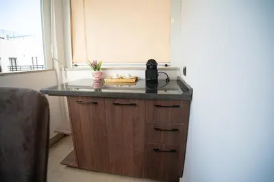 a kitchen with a counter top and a sink at Downtown Private terrace in Casablanca