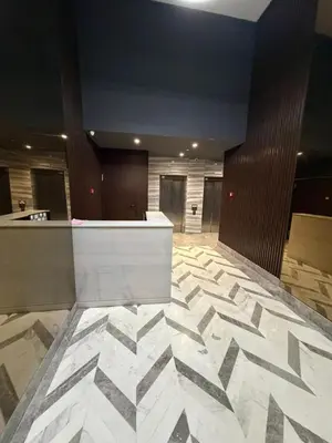 an empty lobby with a marble floor in a building at Premium Business Suite Heart of Casablanca in Casablanca