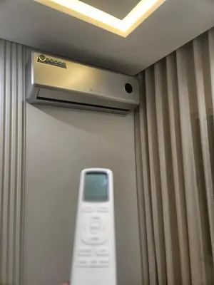a remote control sitting on the wall of a room at Large luxurious apartment opposite to Hassan 2 Mosqu and FAIR international casablanca , near downtown prohibited arb unmarried couples, Free underground parking for buildings, 3 rooms, 2 bathroom, living room in Casablanca