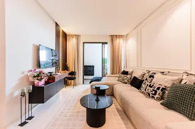 a living room with a couch and a table at New Architect & Design Studio - CFC & Maarif in Casablanca