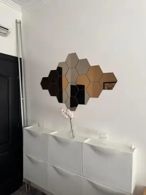 a wall art of a flower on a wall at Apartment dar bouazza in Dar Bouazza
