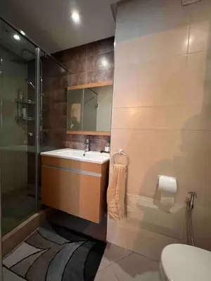 a bathroom with a sink and a shower at Appartment Maarif proche toutes commoditées in Casablanca