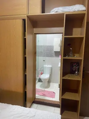 a bedroom with a bunk bed with a toilet at Appartement andalous bouskoura in Bouskoura