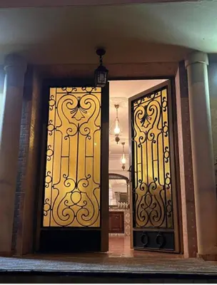 a pair of doors in a room with at \u9526\u9ca4JinLi Villa 21 in Casablanca