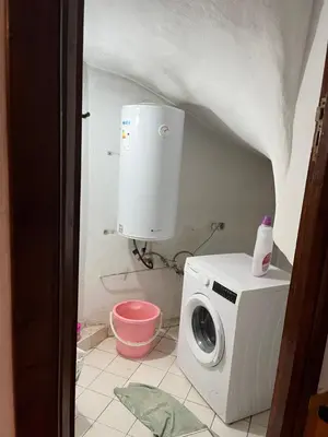 a washer and dryer in a bathroom with at \u9526\u9ca4JinLi Villa 21 in Casablanca