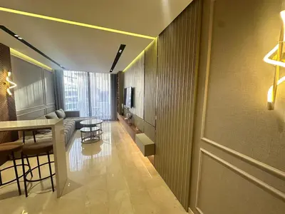a living room with a couch and a table and chairs at Luxurious studio for princesses in Casablanca