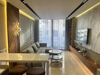 a living room with a couch and a table and chairs at Luxurious studio for princesses in Casablanca