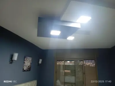 a room with a ceiling with lights on it at Loge studio agdal in Rabat