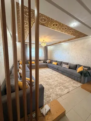 a living room with couches and a couch at Beautiful Apartment for Rent in Corniche de Rabat in Rabat