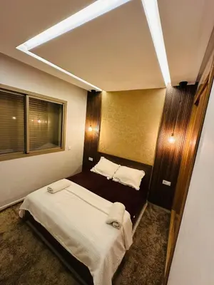 a room with a bed and a window and a bed sidx sidx sidx at Studio tout équipé pour un séjour confortable 22 in Casablanca