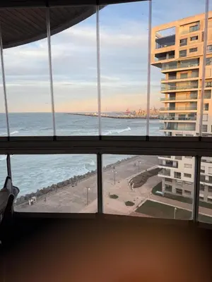 a view of the ocean from a window at Marina de Casablanca in Casablanca