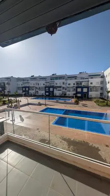 a view of a swimming pool in a building at Blue Haven Pool Suites in Pont Blondin