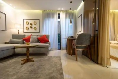 a living room with a couch and a bed at Luxury Studio near to H2M Area in Casablanca