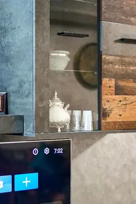a glass cabinet with a vase in it at Forest View -3 Bedroom Apartment - Near Airport in Nouaseur