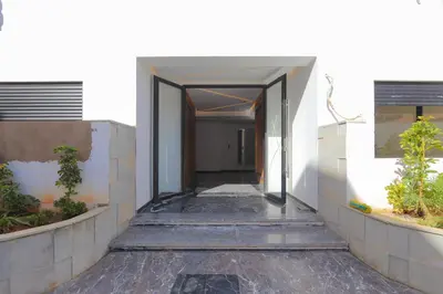a hallway of a building with an open door at New and bright stylish studio in Casablanca