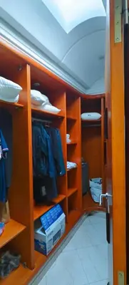 a room with wooden shelves and a closet at \u9526\u9ca4JinLi 28villa in Casablanca