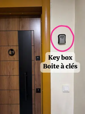 a door with a key box at Opposite Train Station & Tram Modern Quiet & Meals Available in Casablanca