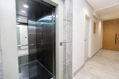 a glass shower in a room with a hallway at Premium Studio H&M - Near CFC and Anfa Park in Casablanca
