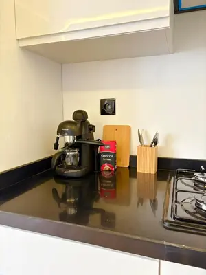 a coffee maker on a counter in a kitchen at Quiet, Sunny Studio 3 min CFC - Self-Check-In in Casablanca