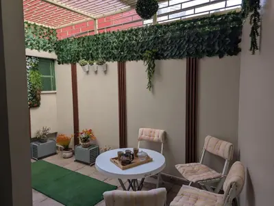 a patio with a table and chairs on a patio at Studio cosy avec patio privé -centre Rabat- Océan in Rabat