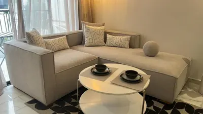 a living room with a couch and a table at Casablanca Luxe studio in Casablanca