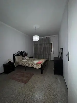 a bedroom with a bed in a room at House for rent in Agdal in Rabat