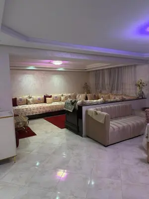 a large living room with couches and a table at Saad's villa in Mohammedia