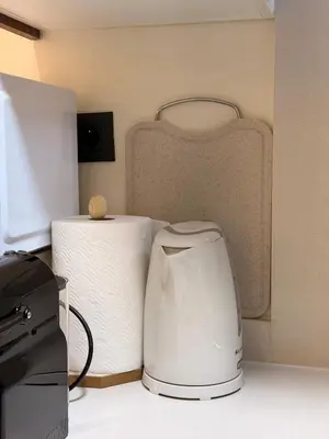 a kitchen with a toaster and a roll of paper towels at Cozy & Well-Equiped Studio - Valfleuri in Casablanca