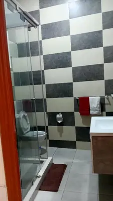 a bathroom with a toilet and a sink at Casablanca City Center Neoclassic Flat in Casablanca