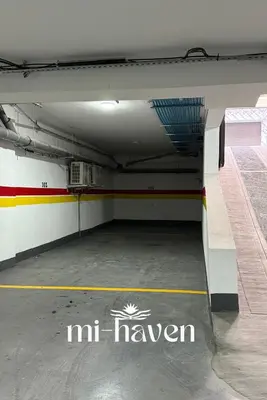 an empty parking garage with a mitt haven sign on it at hamy - 1br - Downtown Casablanca in Casablanca