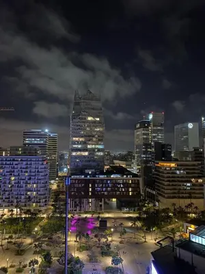 a view of a city at night with buildings at VIVASTAY Casablanca - CFC High-Rise Luxury 2 Bedrooms Panoramic View in Casablanca