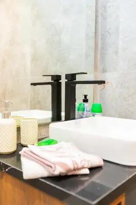a bathroom counter with a sink and a mirror at M Studio cosy princesses in Casablanca