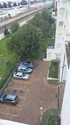 a group of cars parked in a parking lot at Hébergement en lit dans chambre et salle de bain partagées pour Hommes in Rabat