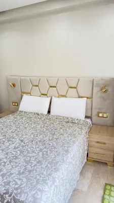 a bedroom with a bed with two pillows at Casablanca Center Studio Karachi 33 in Casablanca